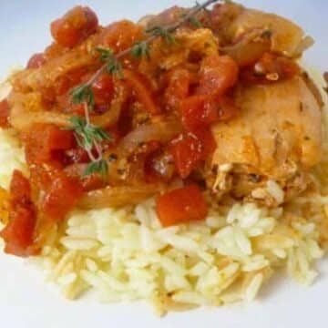 Close up of Chipotle Chicken Skillet recipe served over top of rice.