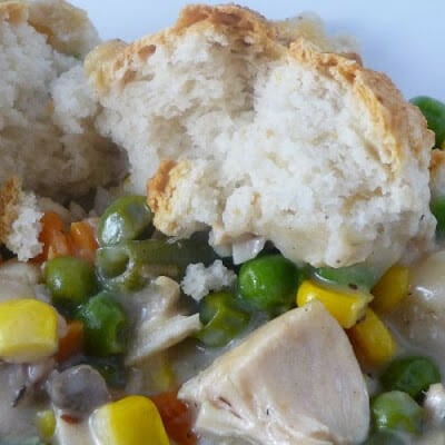 Up close image of biscuit topped chicken pie.