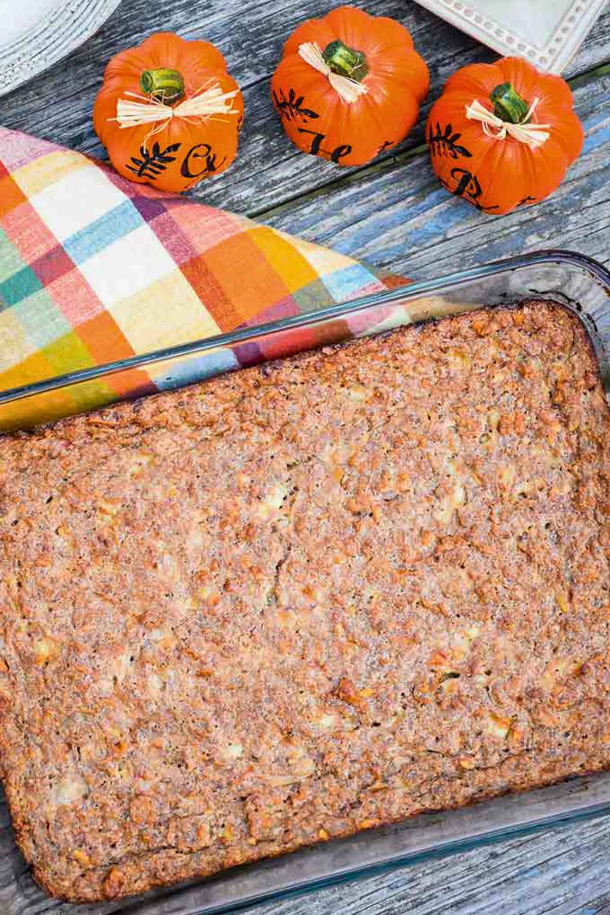 Overhead image of baked vegetarian loaf showing crispy edges and golden brown top.