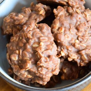 Upclose image of a bowl full of no bake cookies.