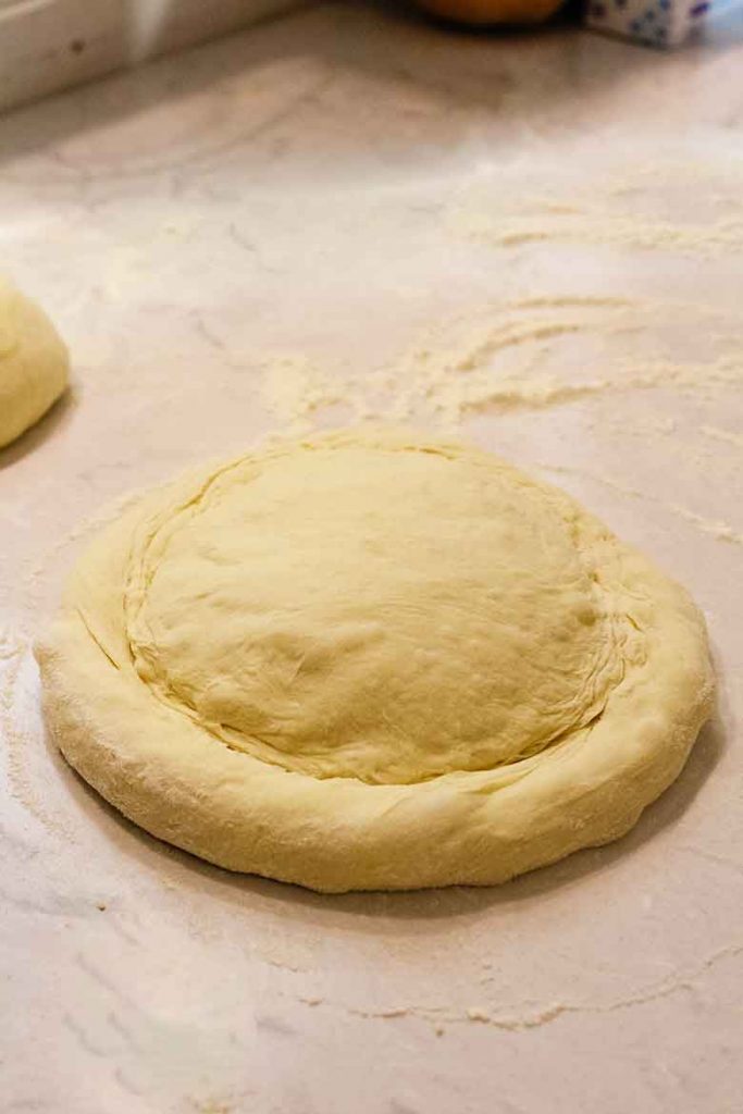 homemade pizza dough recipe ready to stretch and shape