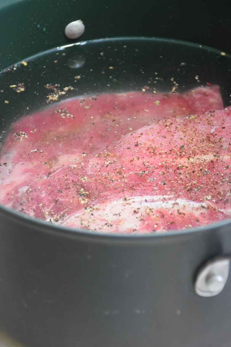 Baby back ribs in the stock pot ready to put on the stove top.