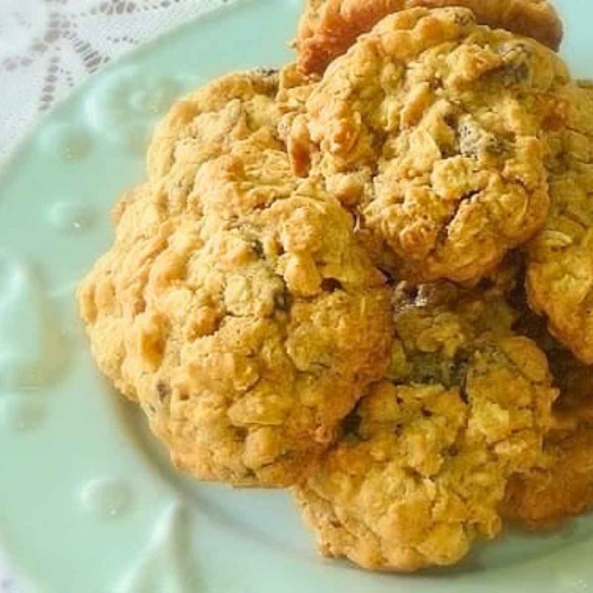 Overhead view of a plateful of vanishing oatmeal cookies.