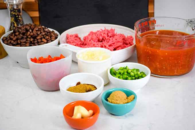 chili ingredients on a white countertop