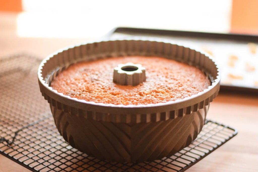 Rustic Pound Cake on a cooling rack in bundt pan