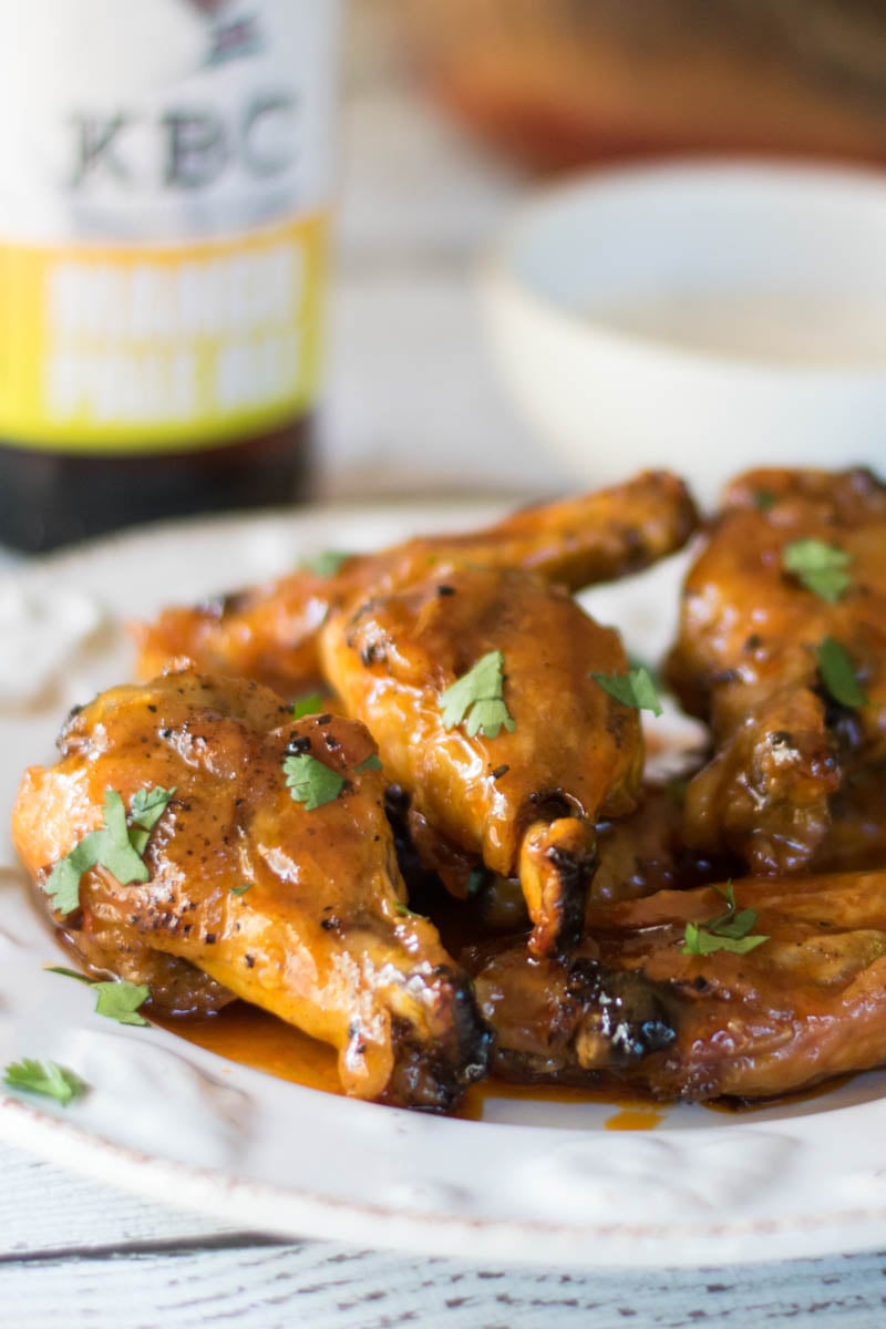 Upclose image of the best Crispy Baked Chicken Wings with a sweet hot glaze.