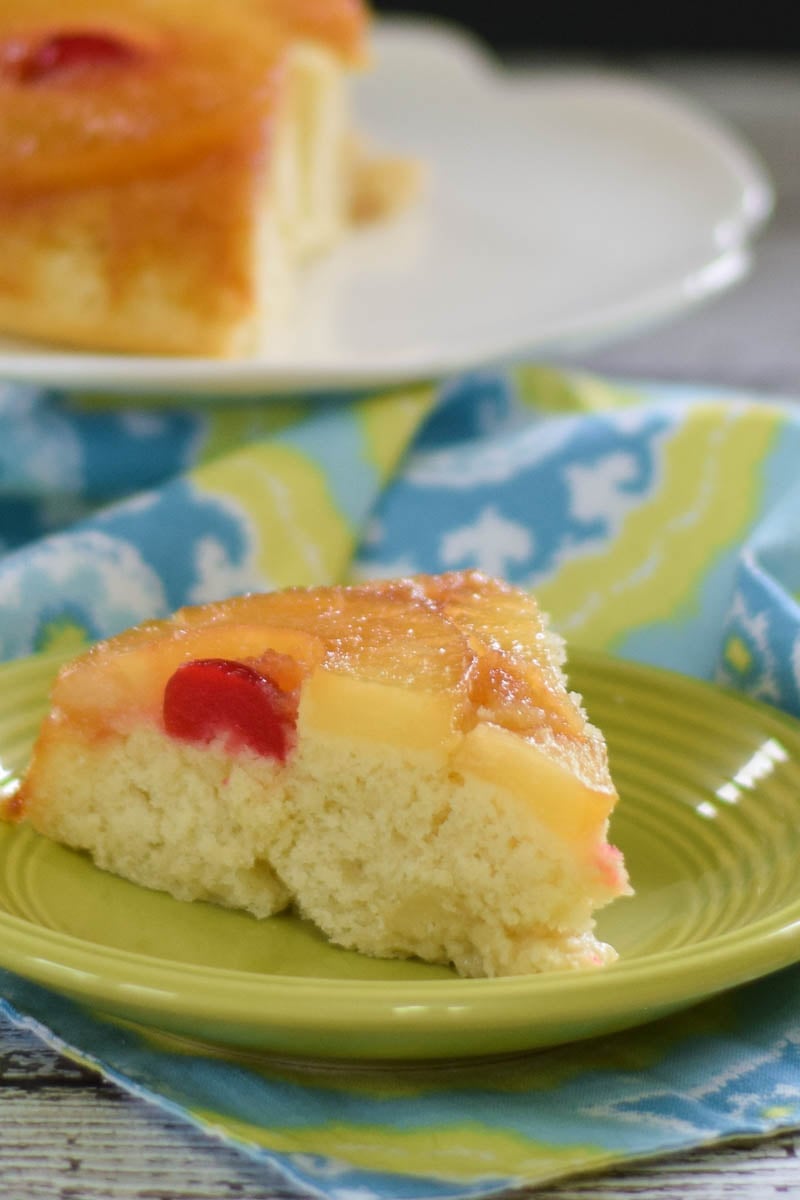 A slice of the best Pineapple Upside Down Cake on a plate.