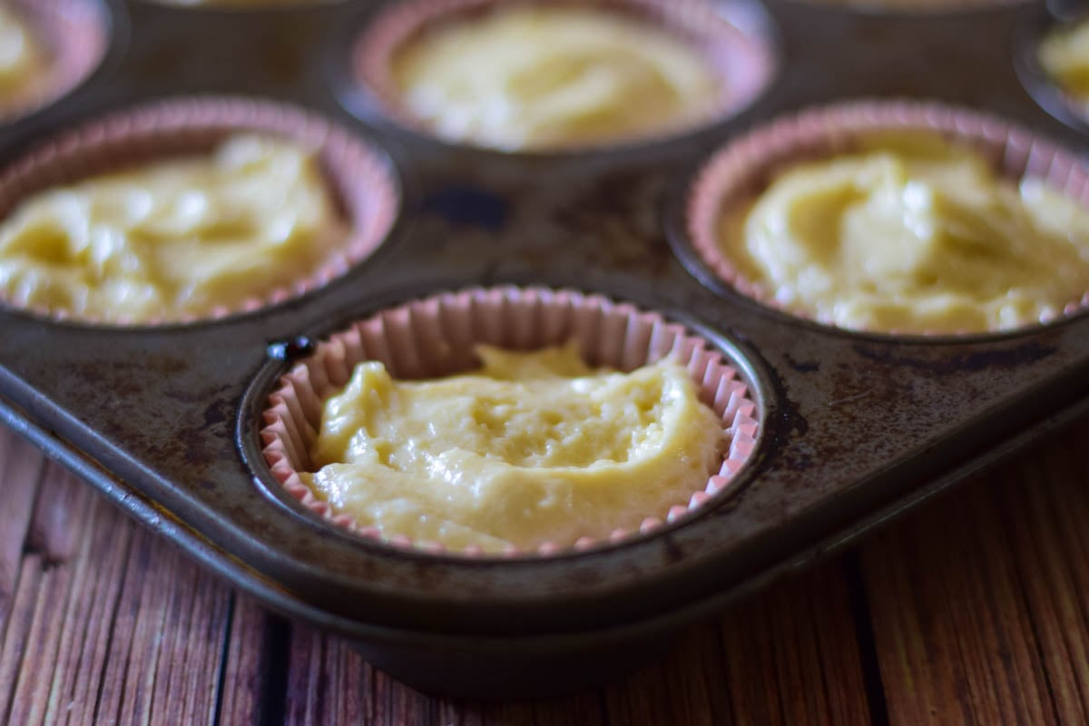 Cupcake batter in the muffin pan.