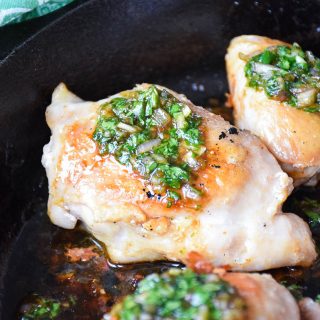 Chicken Thighs with Cilantro Sauce in skillet up close view