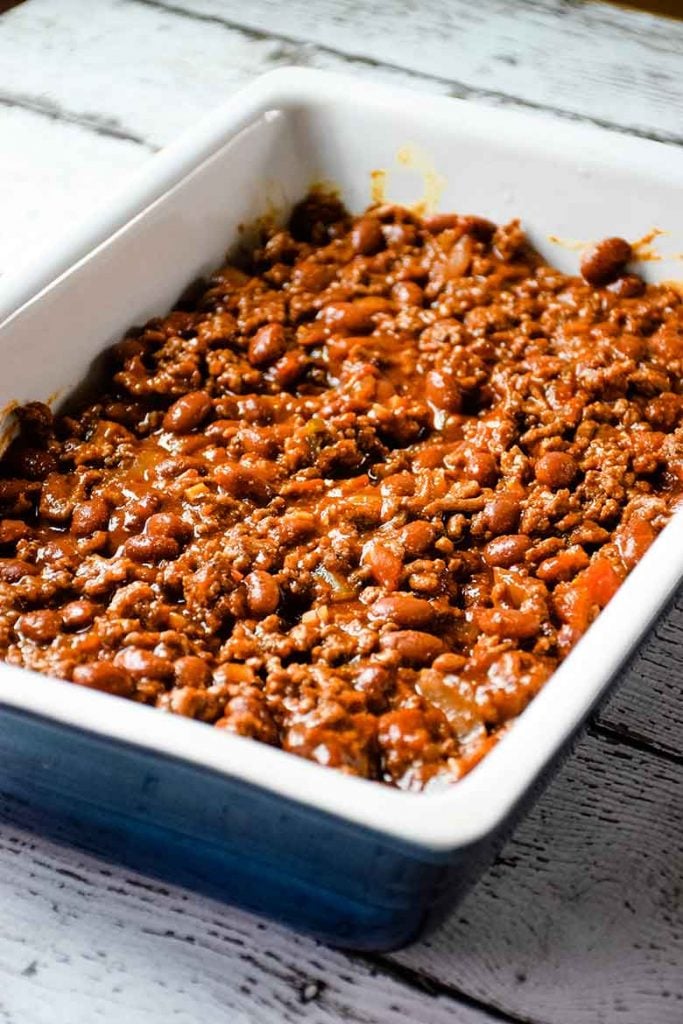 Chili layer over top of hot dogs in casserole dish