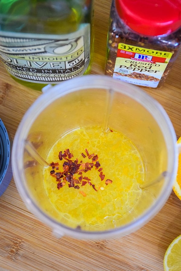 Marinade ingredients in a blender cup.