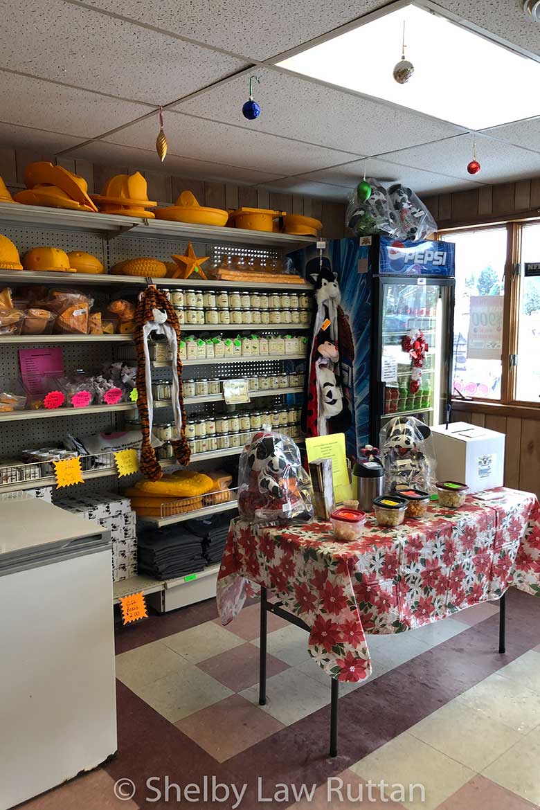 Cheese Sample Stations are set throughout the store.