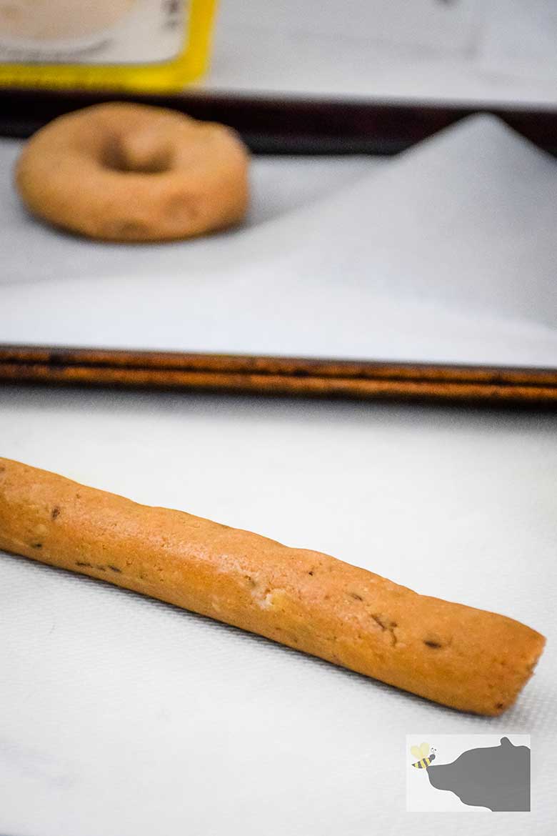 Rolling the dough to make in a circle shape.