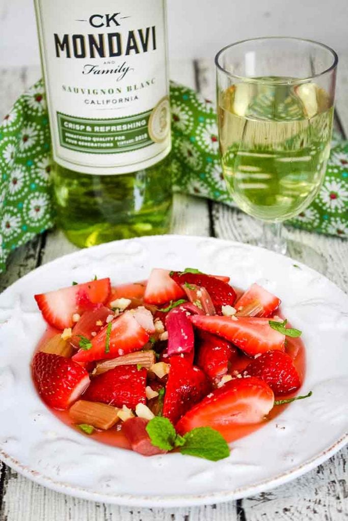 Strawberry Rhubarb Salad on a seashell plate with CK Mondavi Sauvignon Blanc pairing