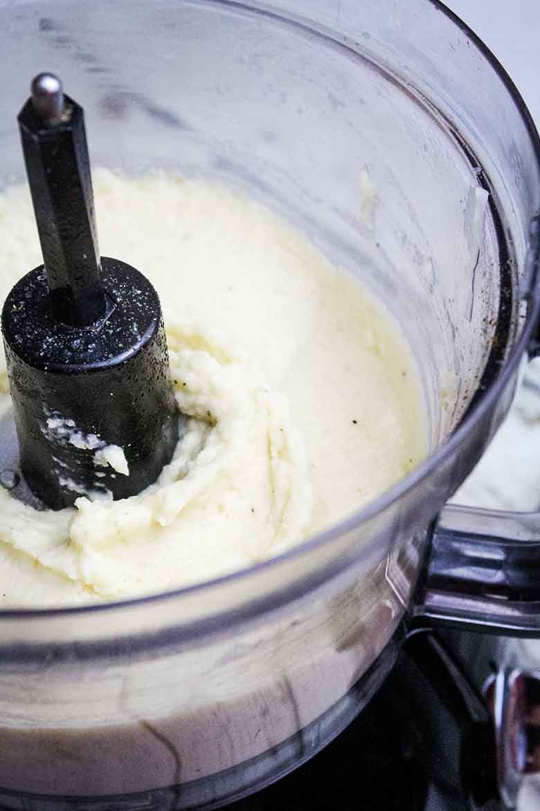 A view of mashed cauliflower in the food processor