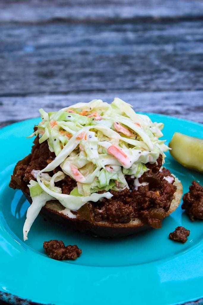 A venison sloppy joe topped with homemade coleslaw recipe