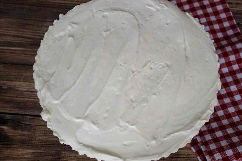 overhead view of cheesecake on serving platter