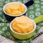 Homemade Microwave Parmesan Cheese Crisps in a small green serving bowl.
