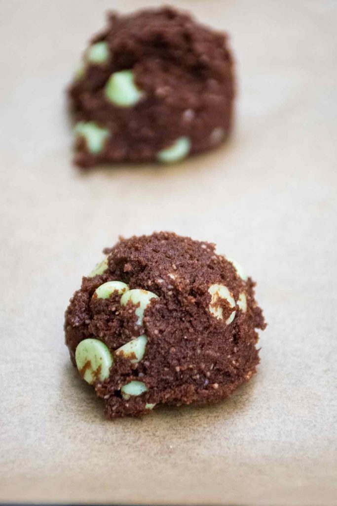 Chocolate cookie dough on the baking sheet.