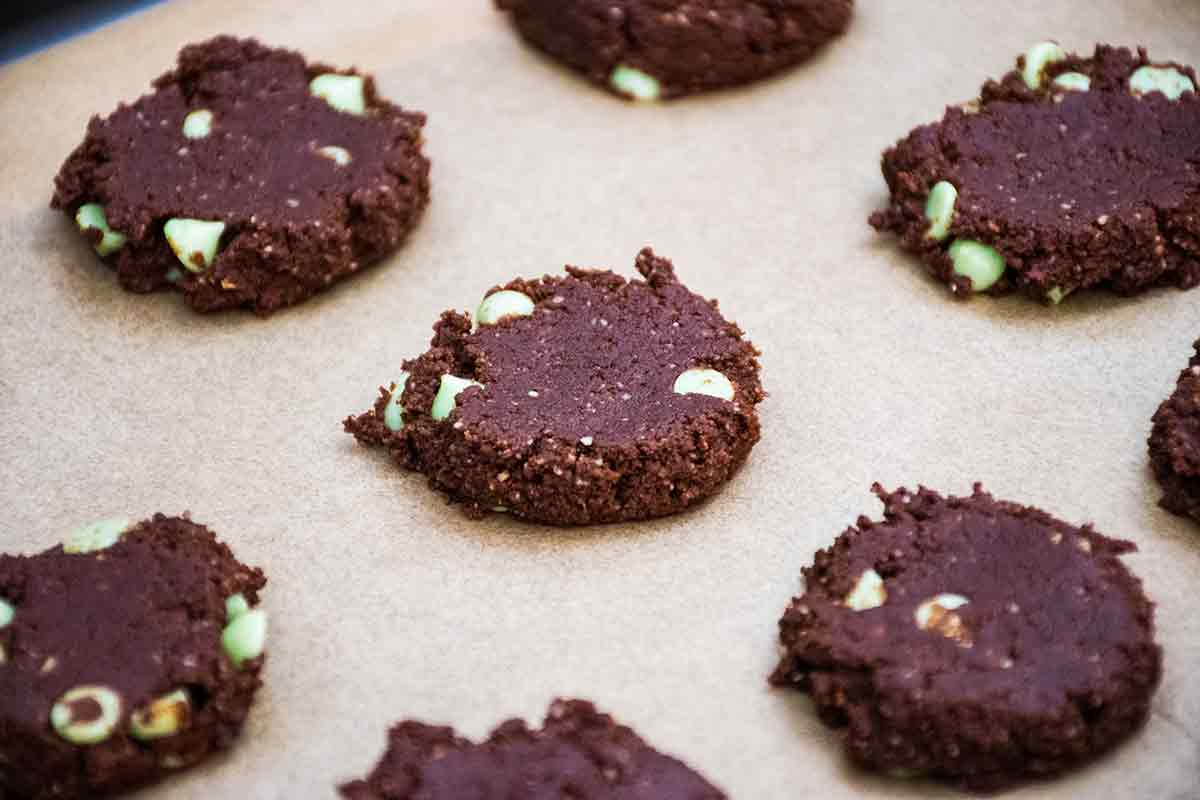 Flattened cookie dough on baking sheet.