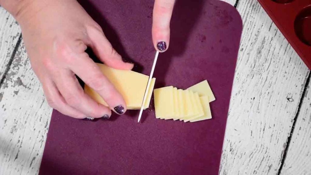 slicing the parmesan cheese