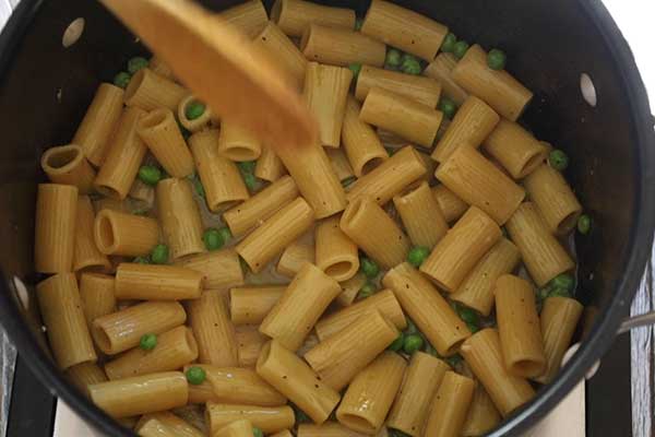 Ziti cooking in the large pot.