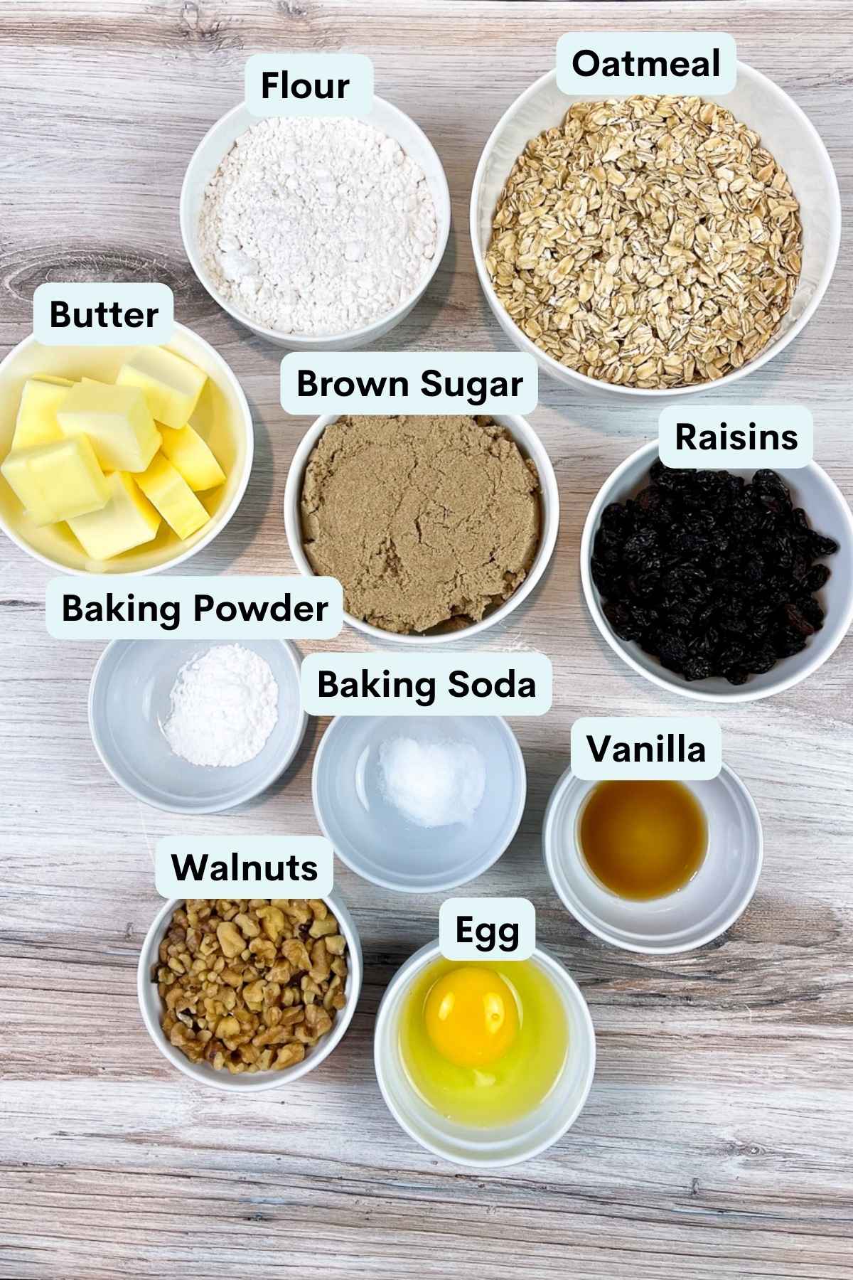 Overhead lay of ingredients measured into white bowls.