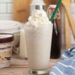Vanilla Bean Frappuccino in a tall glass side view.
