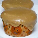 Boiled brown sugar frosting on top of cupcakes.