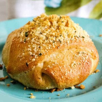 Chicken baseballs on a turquoise plate.