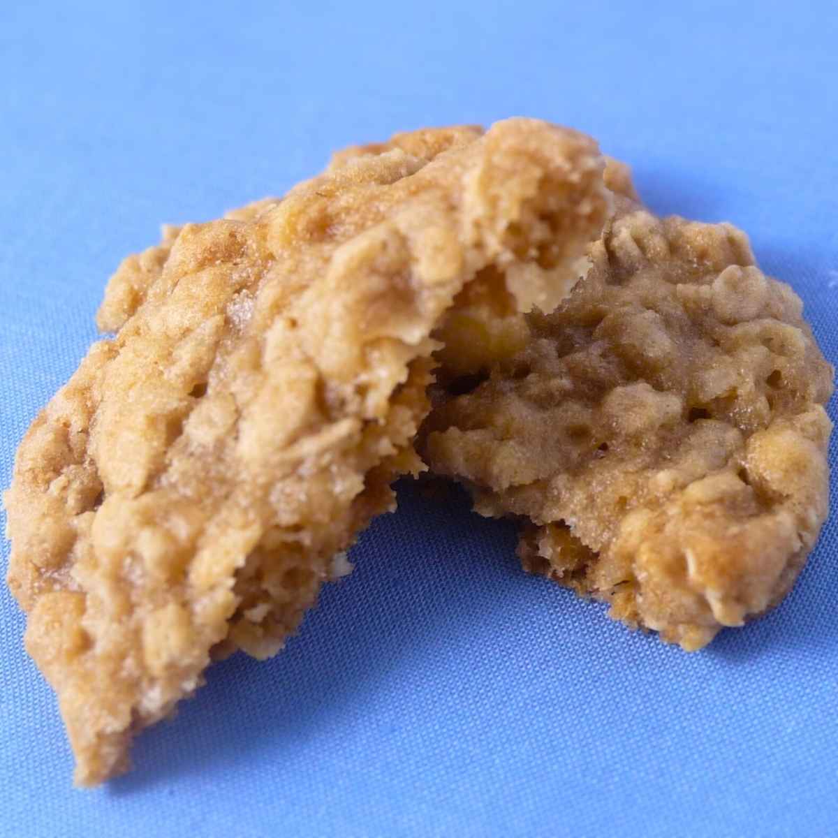 One cookie broken in half and stacked.