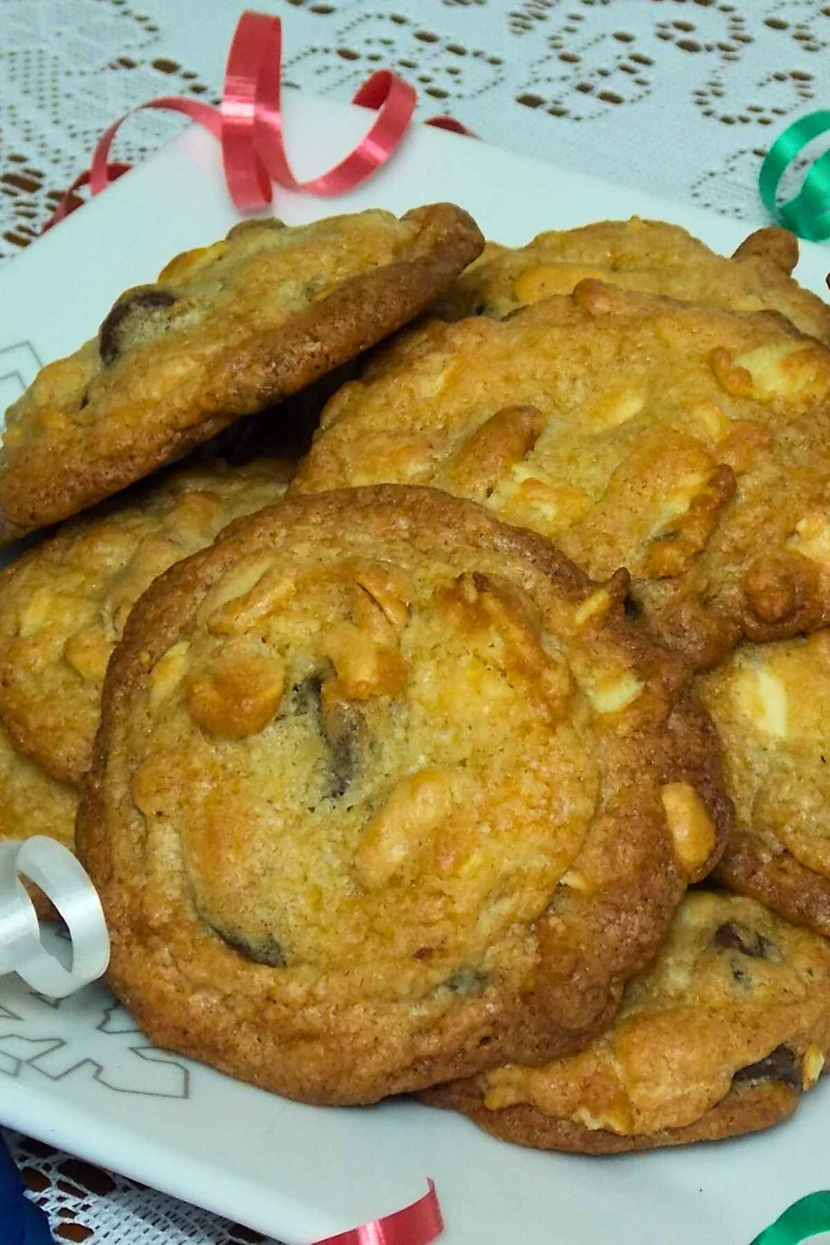 A white plate with a stack of potato chip cookies.