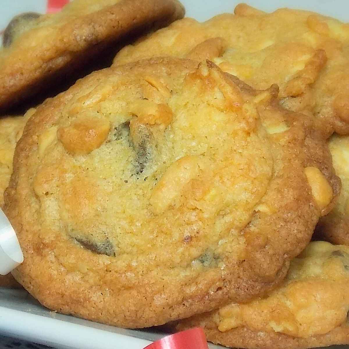 Upclose image of kitchen sink cookies on a white plate.