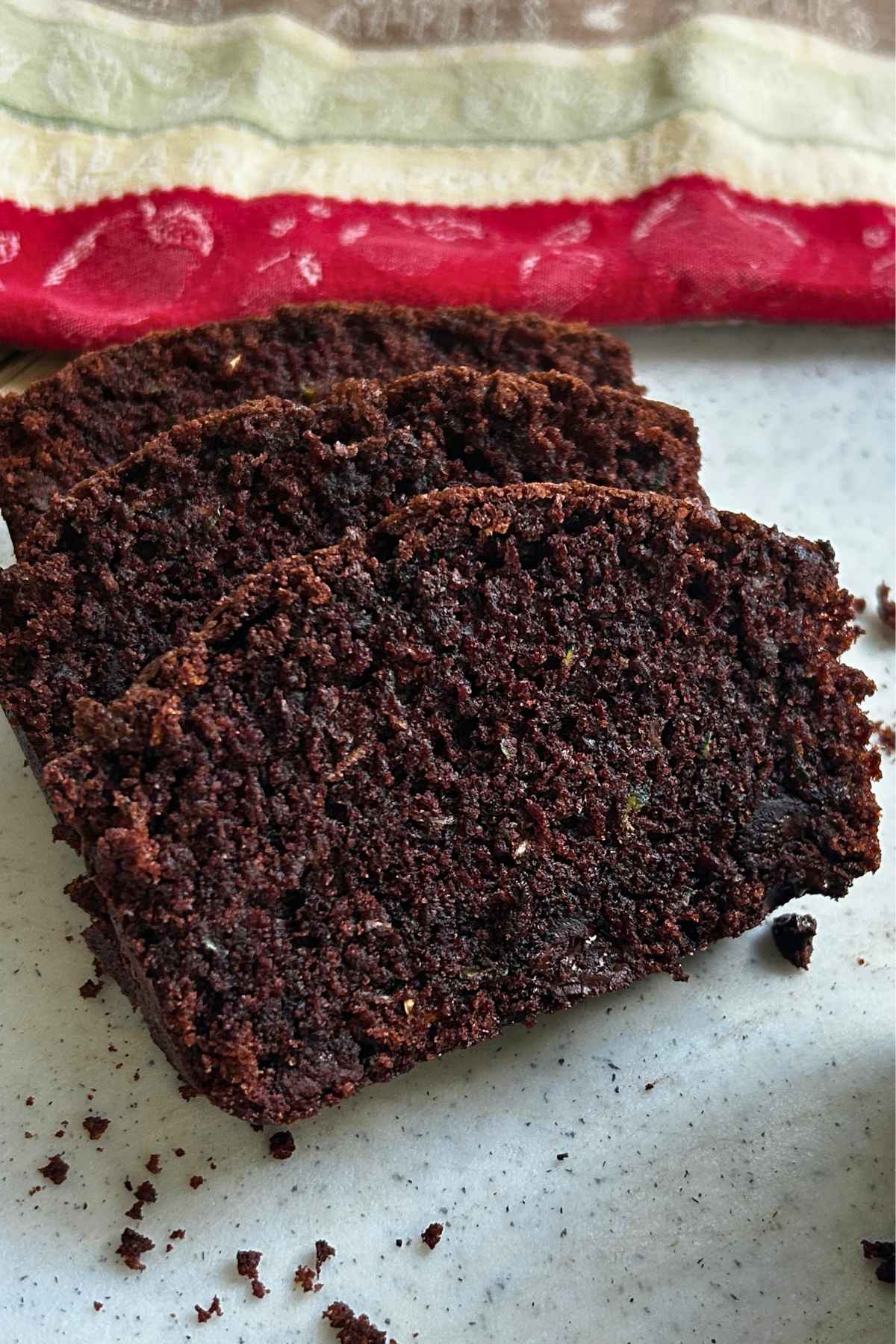 Close-up of sliced double chocolate zucchini bread.