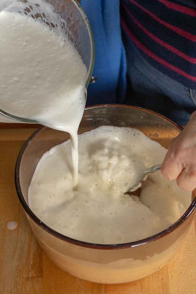 Adding mlk mixture to cooled rice.