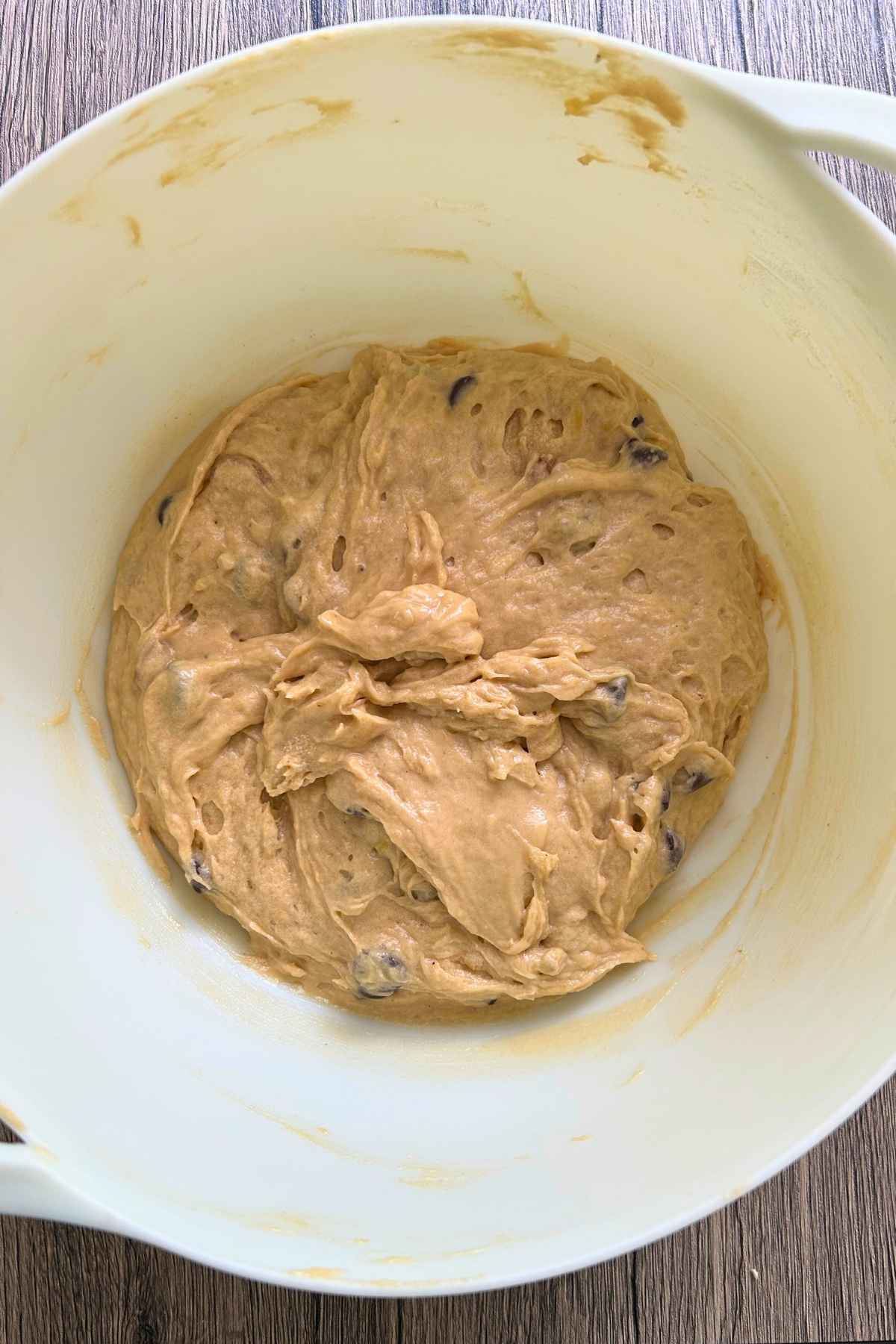 Soft cookie dough in a mixing bowl.