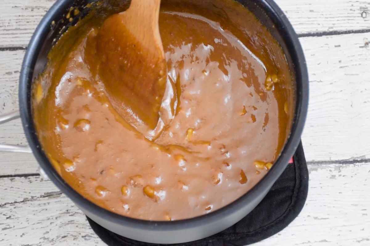 Brown sugar fudge that has loss it's gloss and ready to pour into the prepared pan.