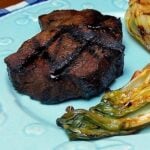 One marinated and grilled venison tenderloin steak.