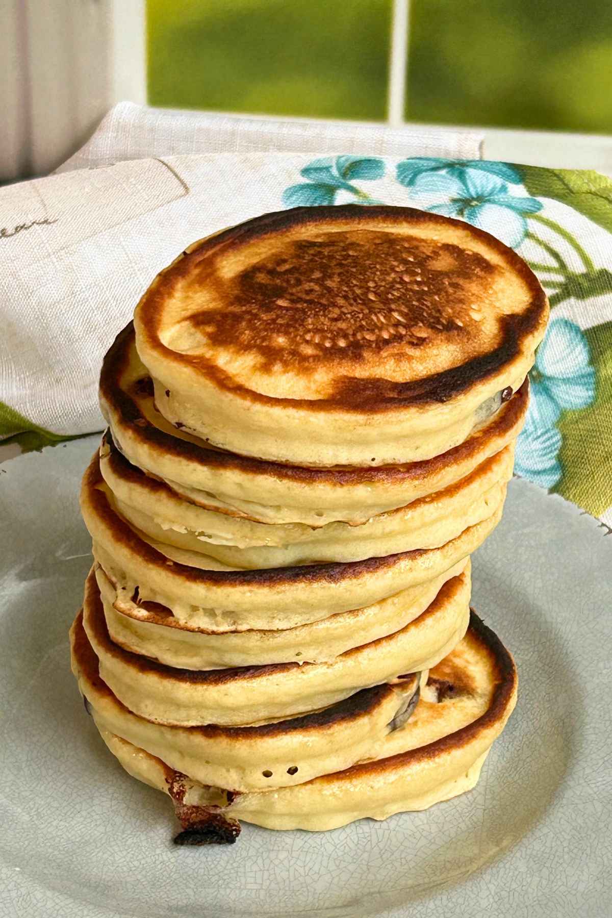 Eight pancakes stacked on top of each other.